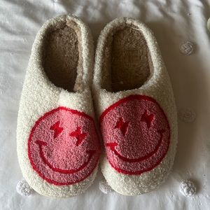 pink smiley face slippers